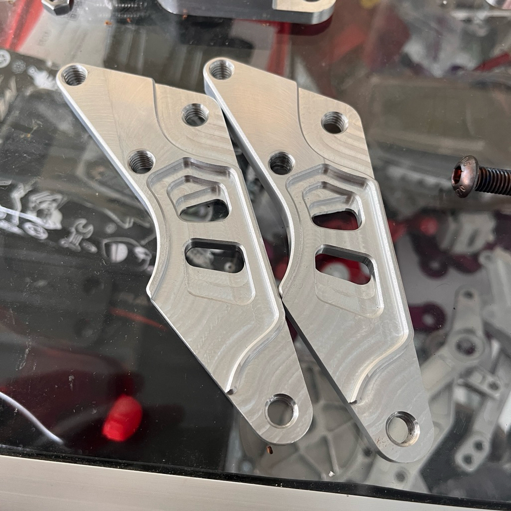 Breket Kaliper 4Piston Supra X 125 Karisma 125 piringan 300mm Breket kaliper Axial Karisma Supra