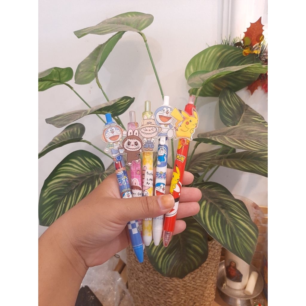 

Bolpen Gel Cetek Labubu Doraemon Pokemon Karakter Lucu
