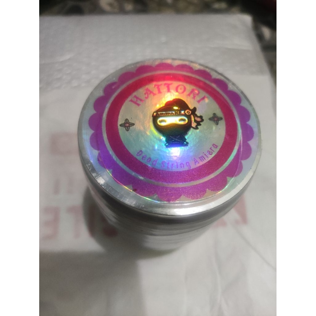 Gelasan Hattori Matot Bahan Abu Logo pink 6000 Yard