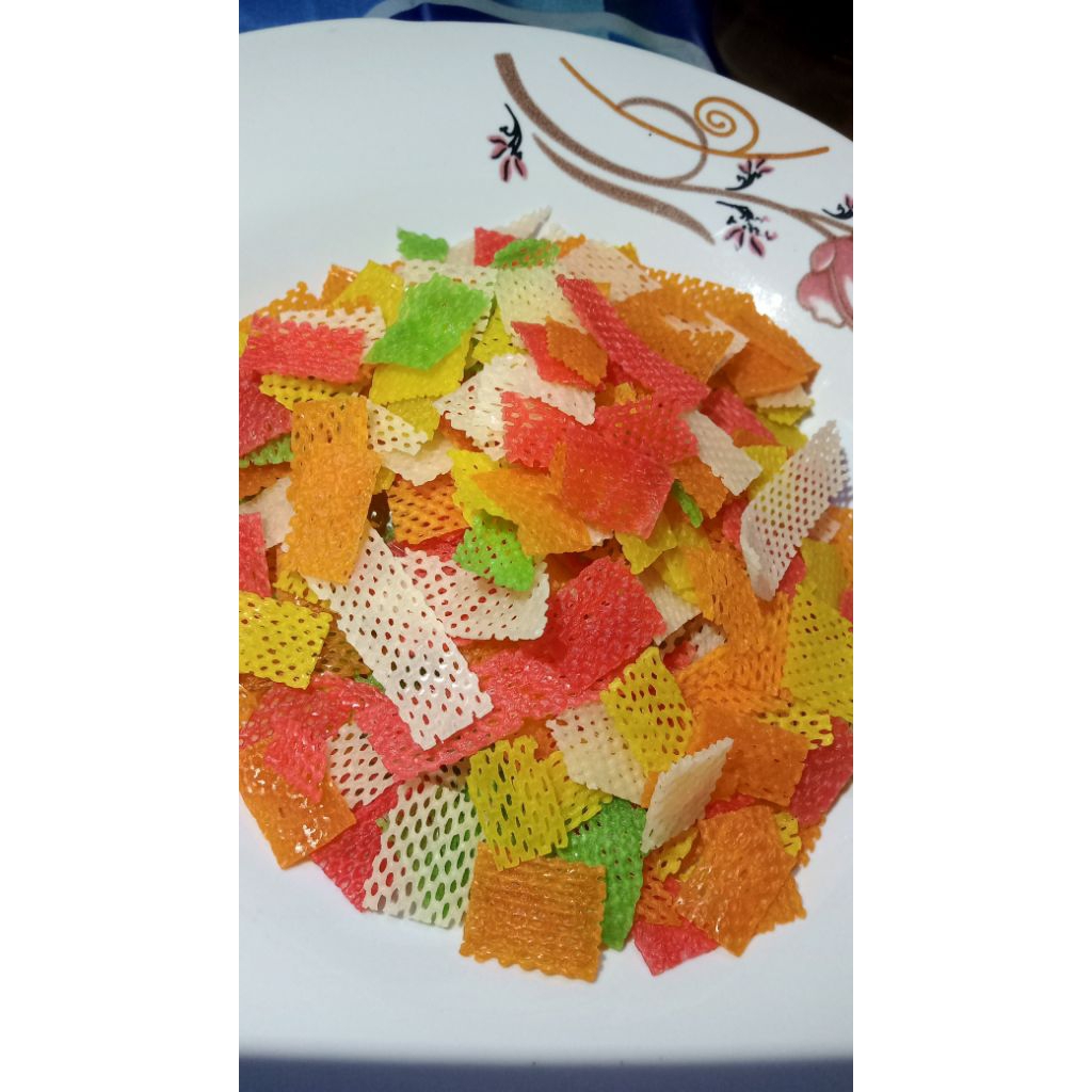 

Krupuk mentah taro warna warni 250gr siap di goreng atau untuk topping seblak