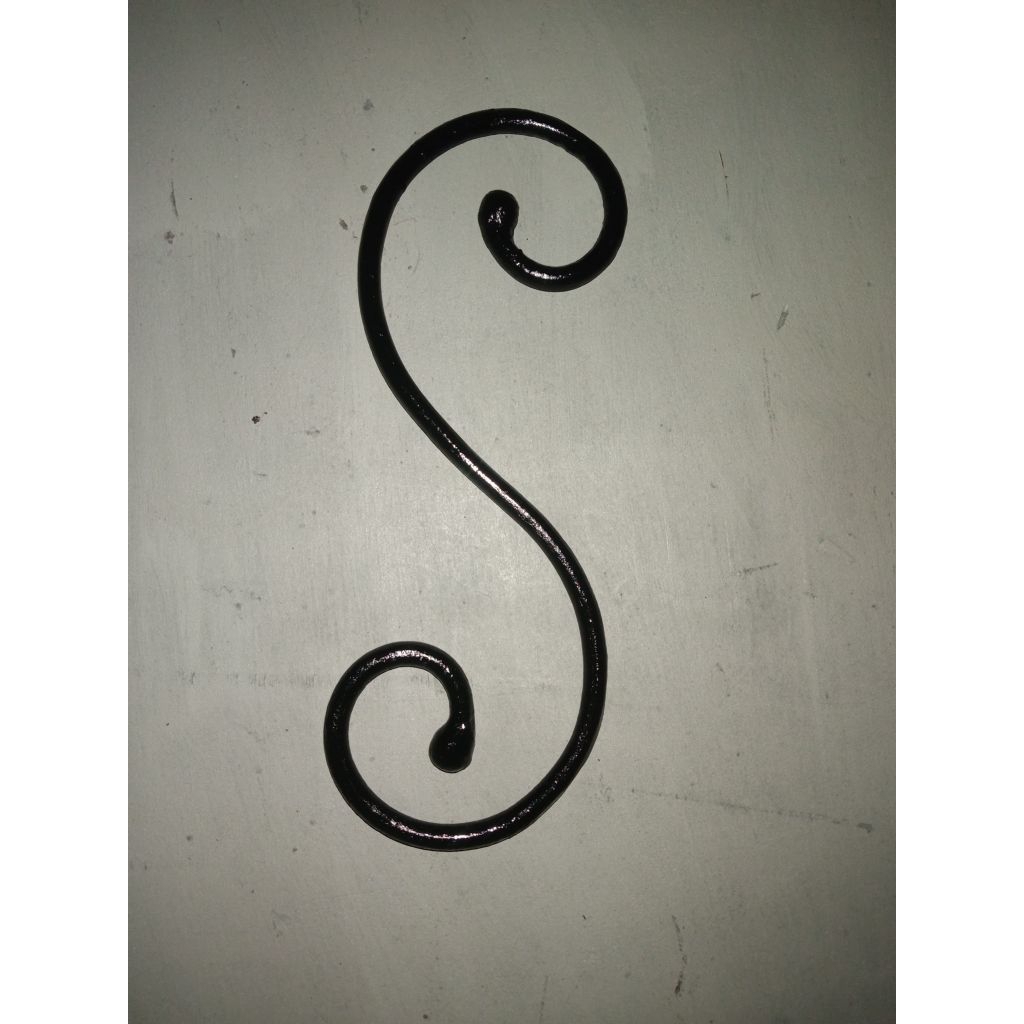 Besi Tempa model Leter S