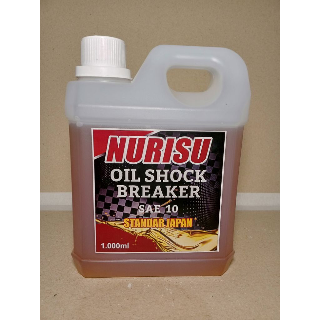 [ JAPAN QUALITY ] OLI SHOCKBREAKER MERK NURISU 1000.ml ( SAE 10 ORIGINAL ) untuk semua shockbreaker 