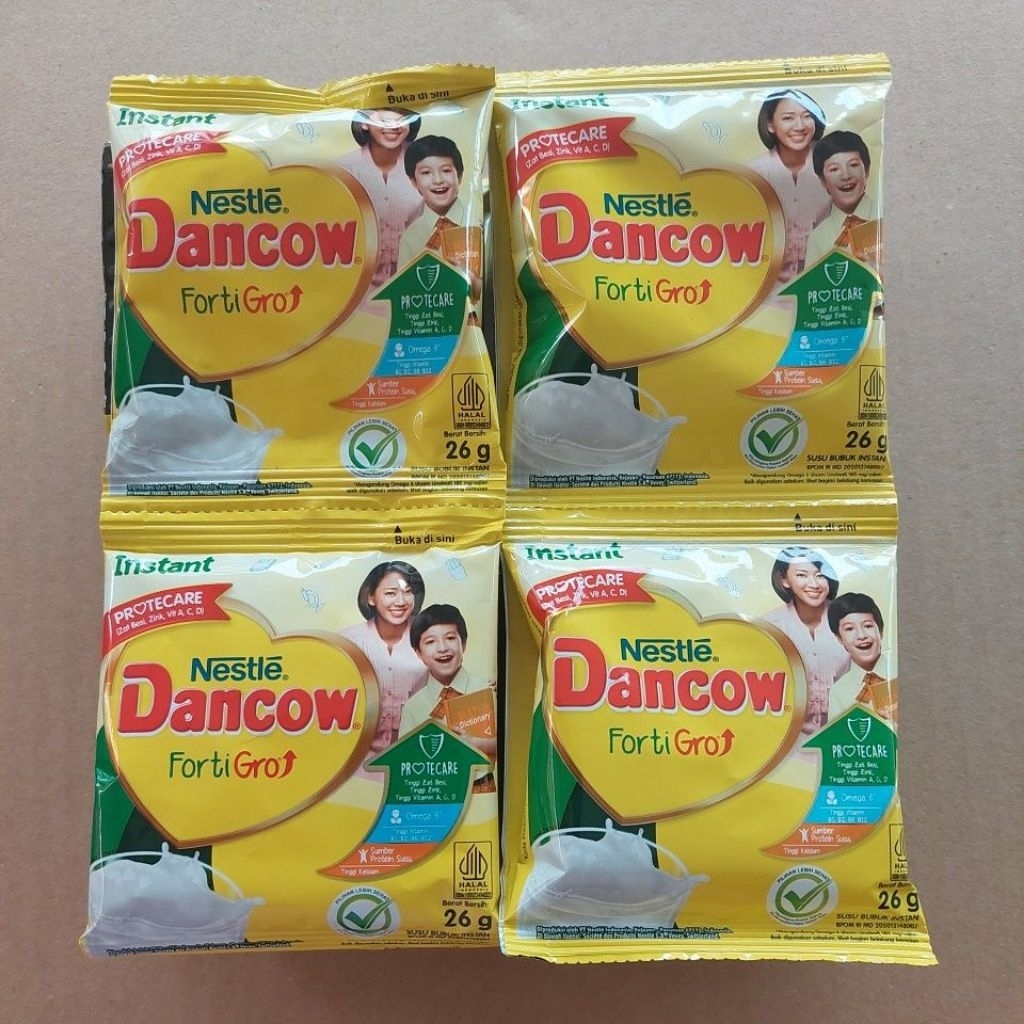 

Susu Bubuk Dancow Sachet Rasa Vanila 1 Rtg Isi 10 bks