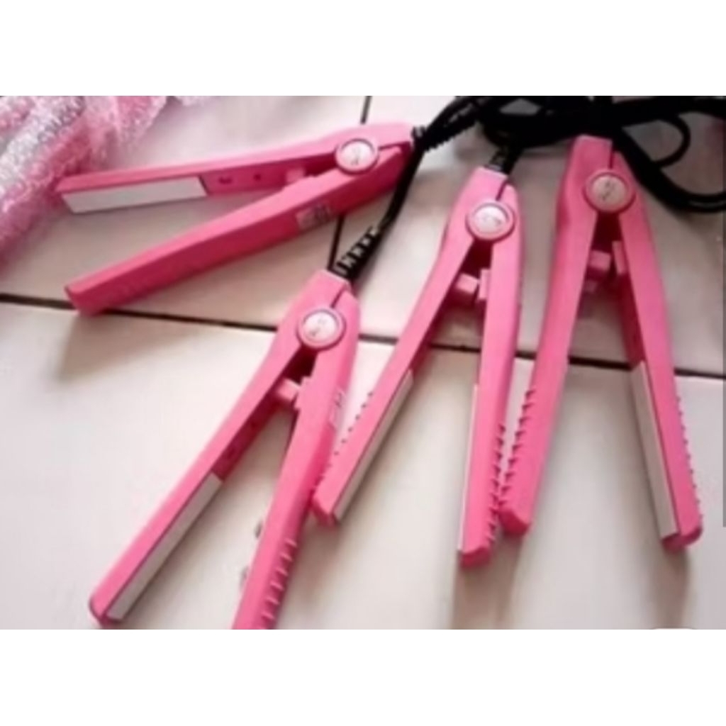 Catokan rambut atau alat pres penutup es buah