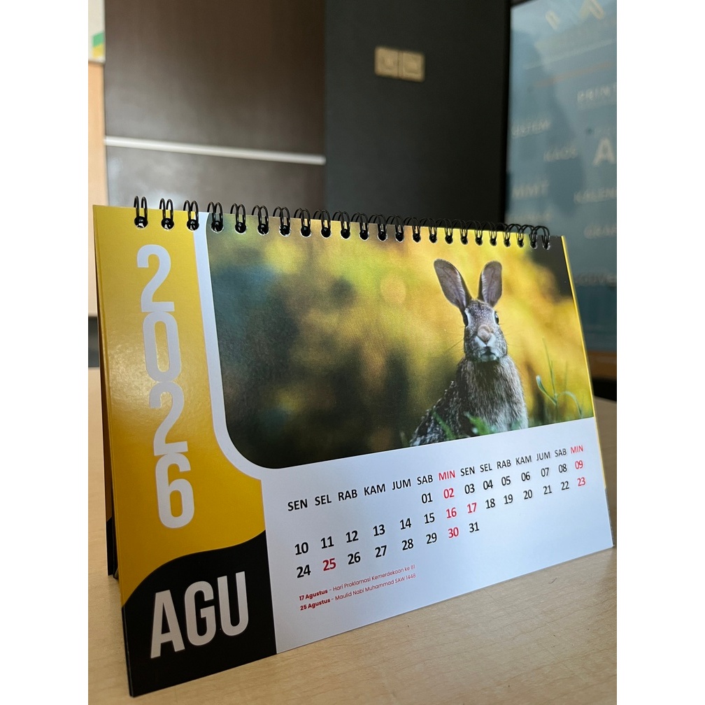 

Cetak Custom Kalender Meja 2026 isi 7 Lembar 2 Muka Penyangga hardbox Linen Ukuran A5 Bahan AC 230