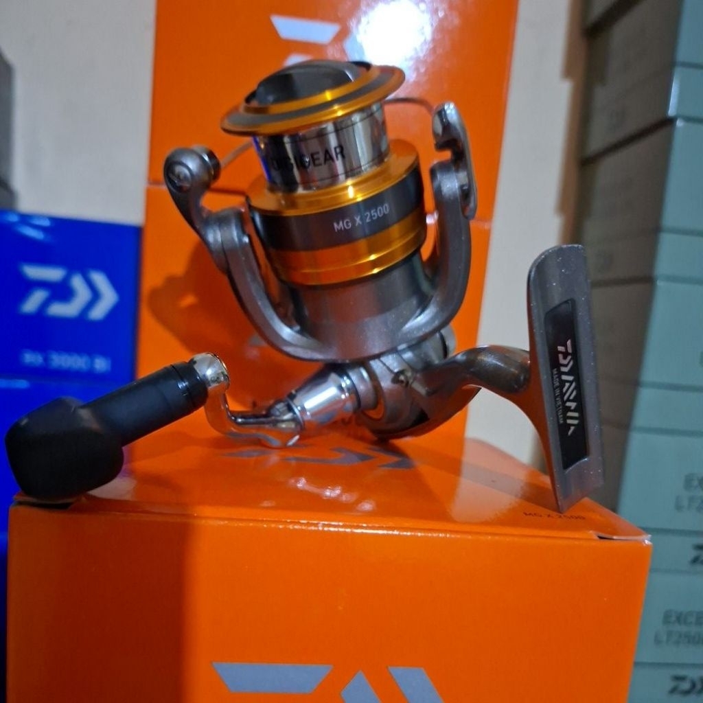 reel daiwa MG X