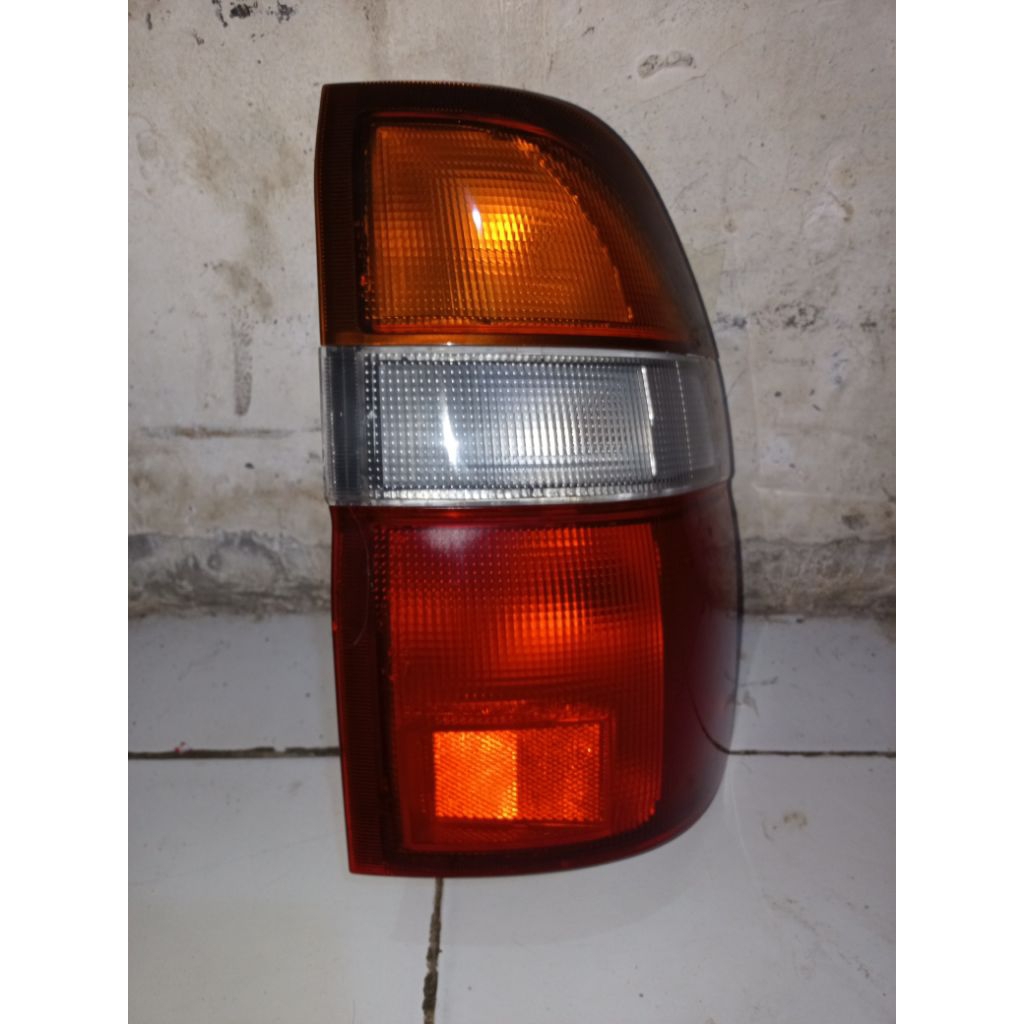 stoplamp lampu belakang isuzu panther touring original ichikoh