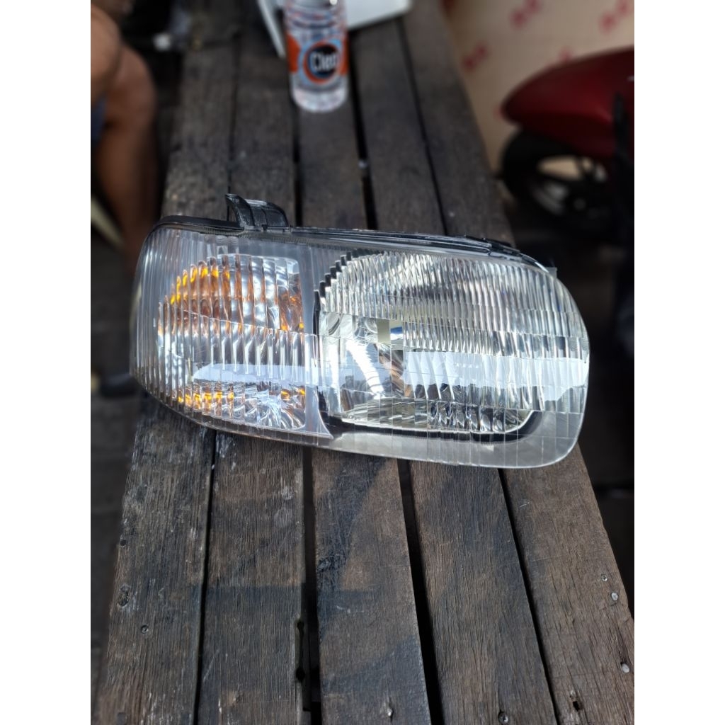 pampu depan headlamp ford escape 2001-2004 original