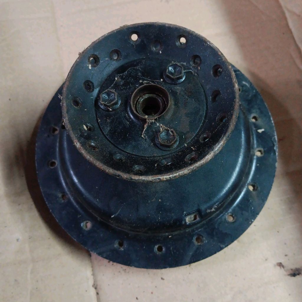 tromol depan ts125 original