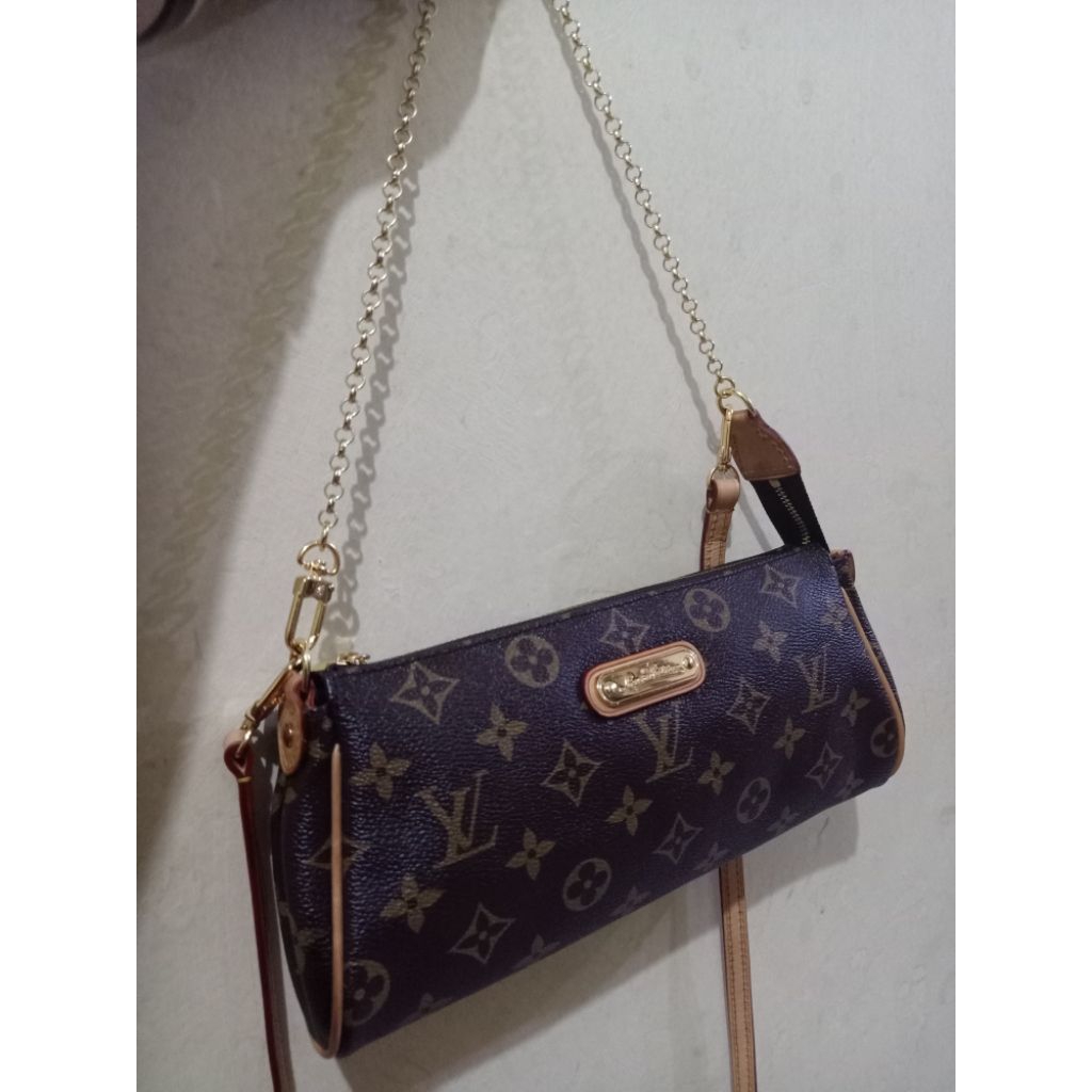 LV Eva Clutch Monogram 2006 Preloved