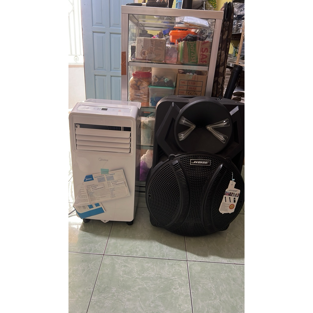 AC DUDUK BEKAS MIDEA