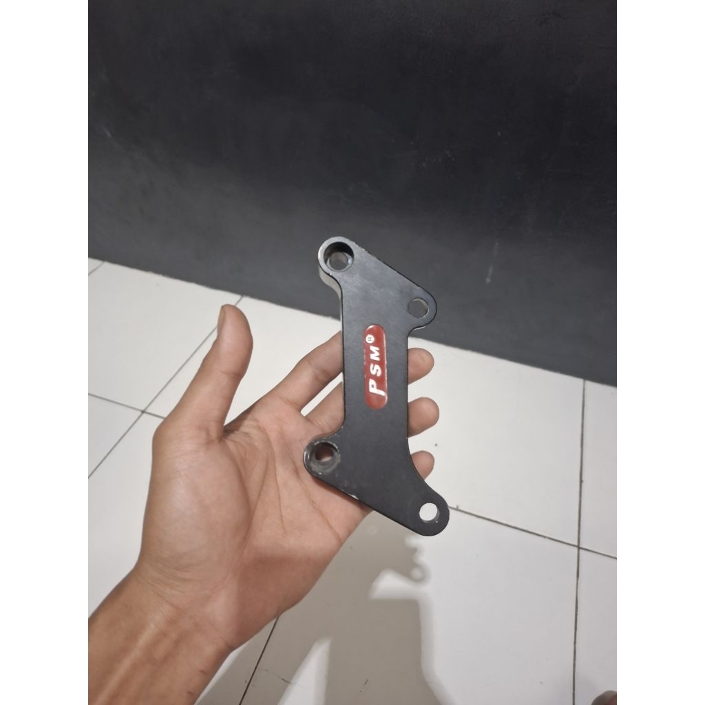 Breket kaliper supra x 125
