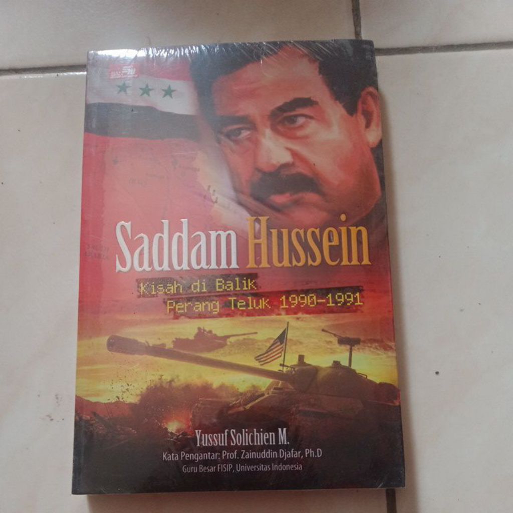 Buku Saddam Hussein kisah di balik perang teluk 1990- 1991 by  yussuf Solichin M