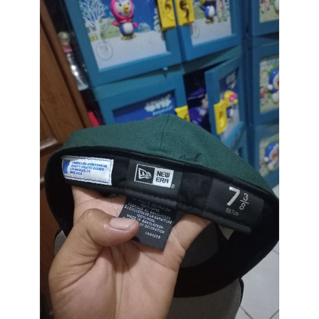 topi NEW ERA UNDEFEATED