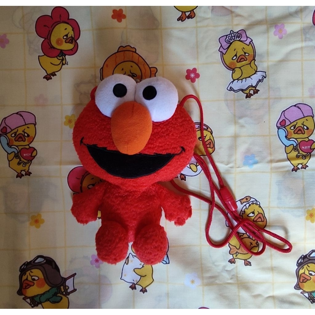 harga 85K (baca deskripsi). Tas Selempang Boneka Elmo. Tas Selempang Boneka Elmo Sesame Street. Tas 