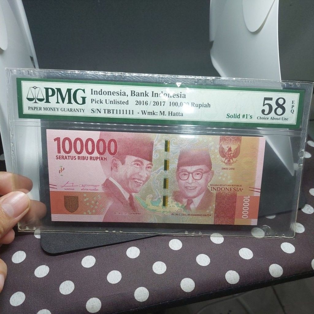 Numismatik UKI Rp seratus ribu Solid Number PMG