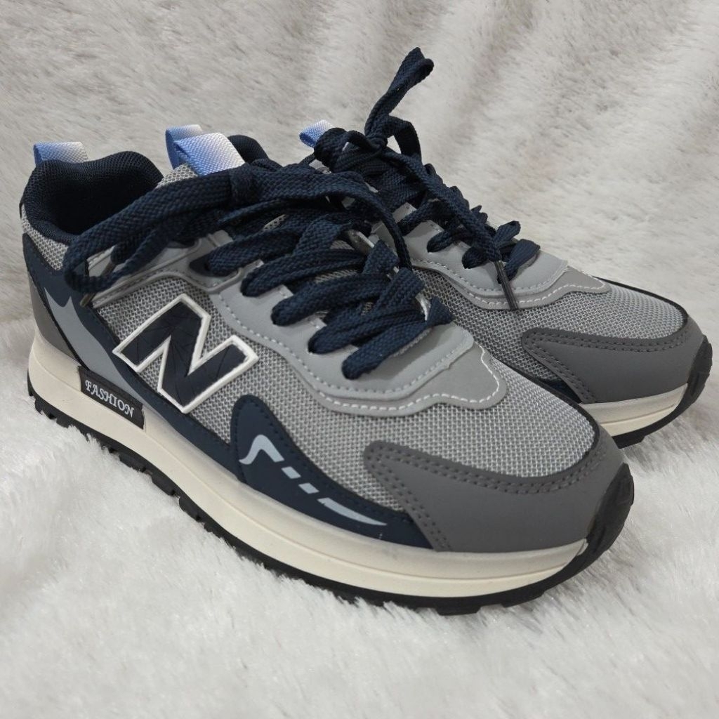 Sepatu sport dewasa laki laki S013