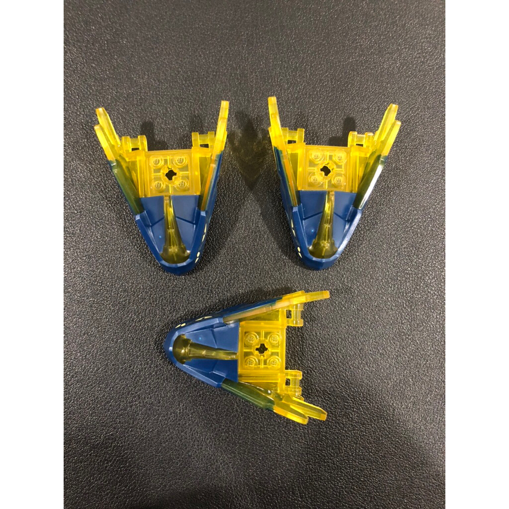 Lego Parts - 100588pb03 - Trans Yellow, Dragon Head (Ninjago) Jaw with Spikes, 4 Studs and 2 Bar Han