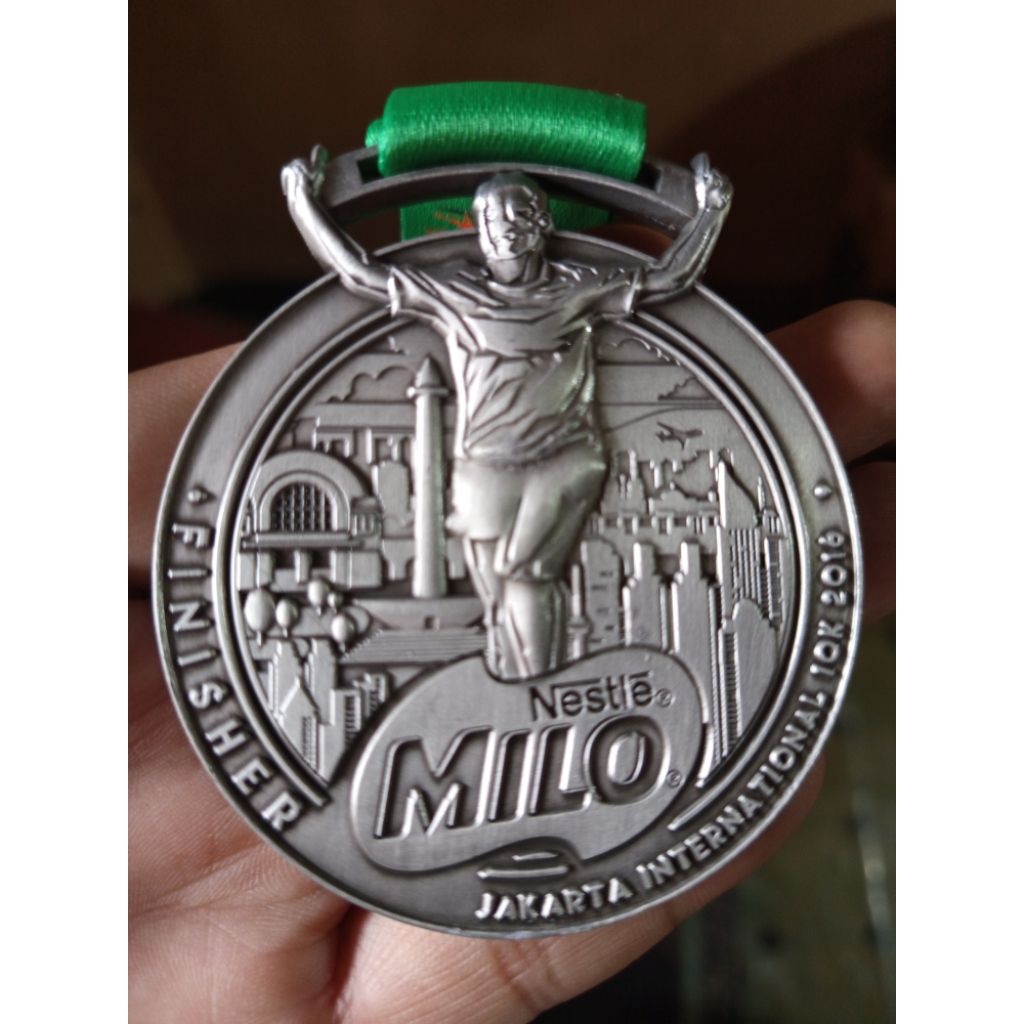 mendali running jkt milo