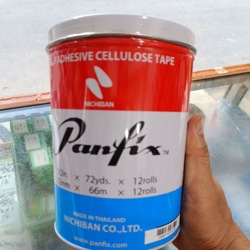 

Isolasi /selotip PANFIX Per kaleng isi 12 roll 1/2 in x 72 yard