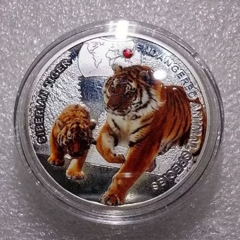 Koin Macan dan Anak Zambia