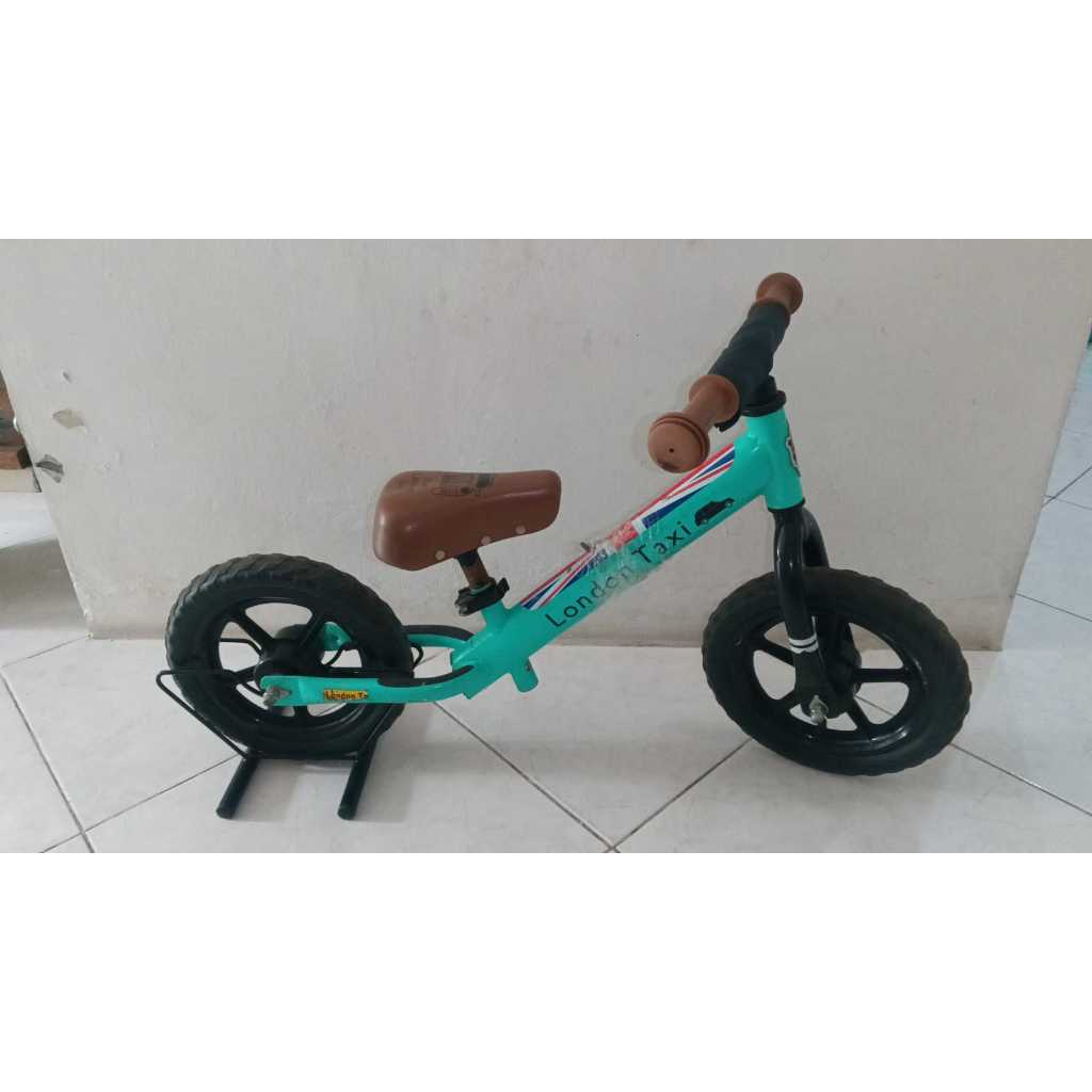 Preloved balance bike london taxi