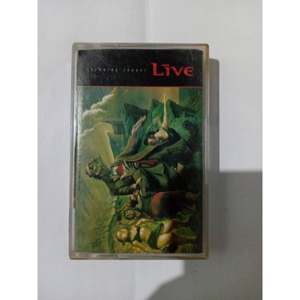 kaset pita band Live album throwing Cooper. produksi 1993. genre alternative