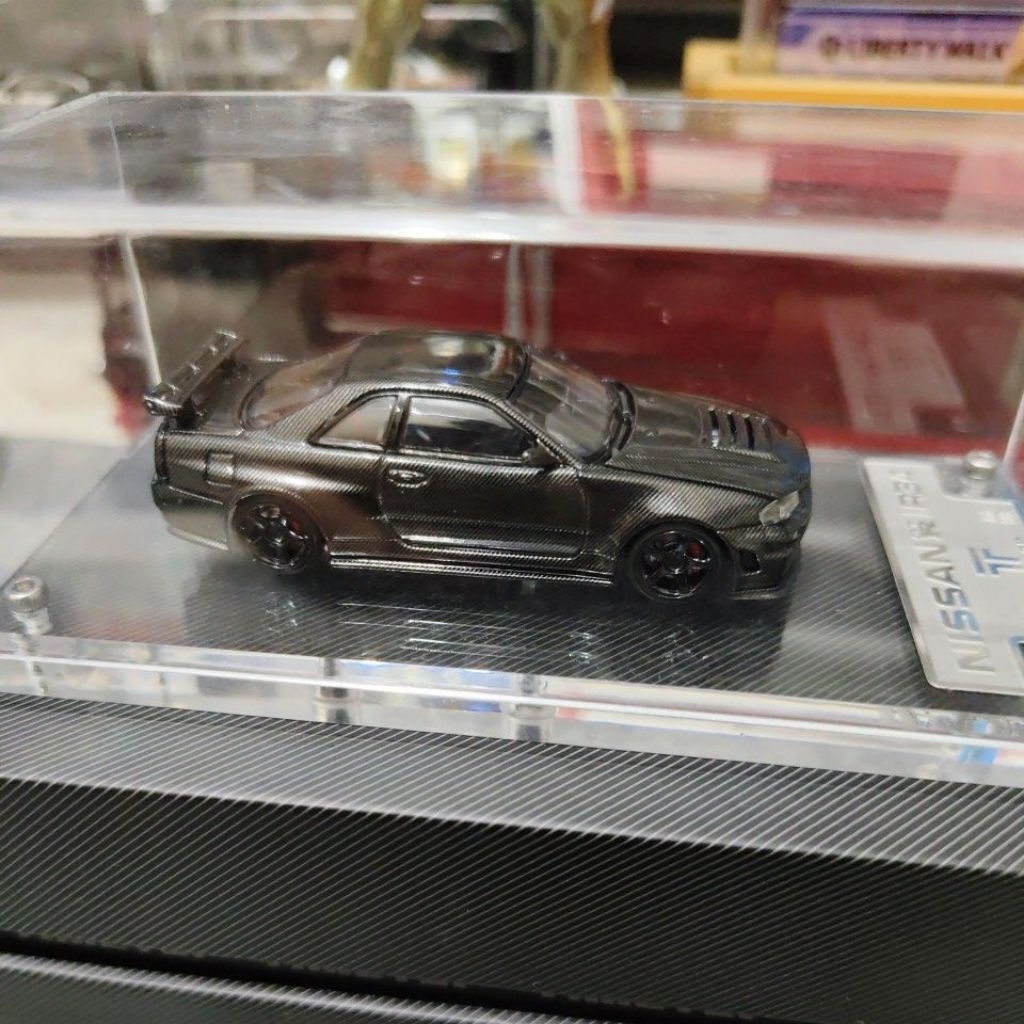 TIME TOP NISSAN SKYLINE GT-R R34 BLACK CARBON WITH FIGURE