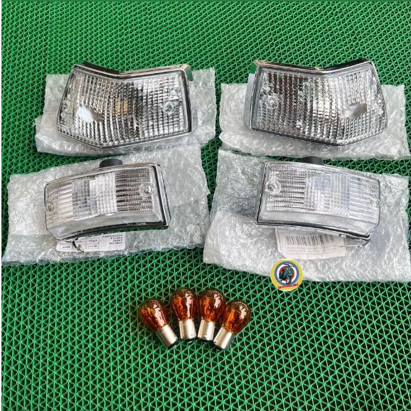 Lampu Sen set Triom by Piaggio muka bening utk PX, Excel dkk