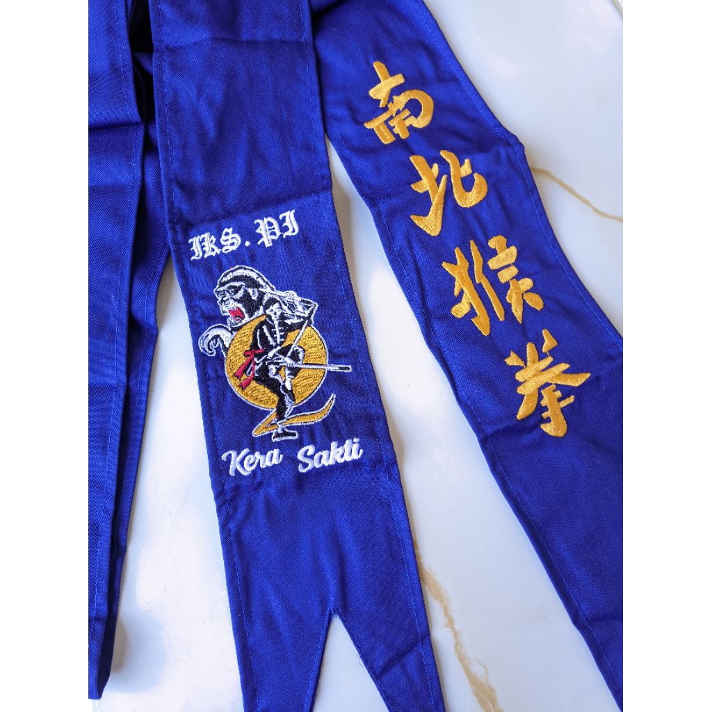 sabuk biru bahan dril iks.pi kera sakti ,panjang 3 meter full bordir (pasangan)