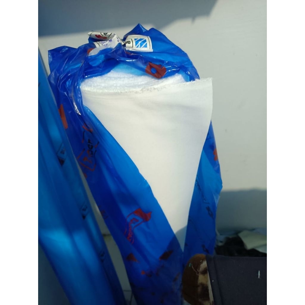 kain keras M 70 lengket untuk kerah(per meter)