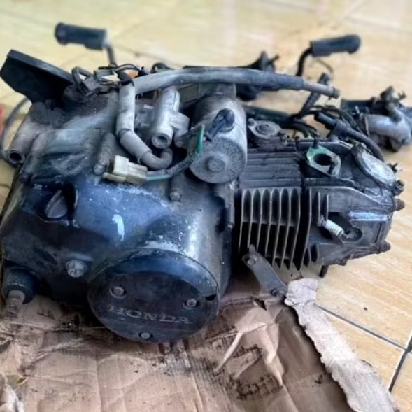 mesin suprax125, karisma