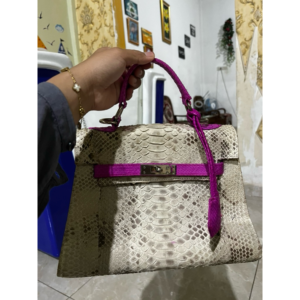 tas piton ori