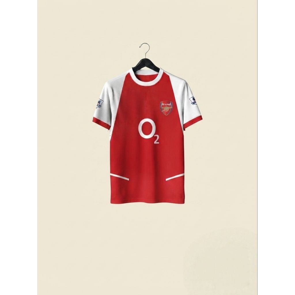 jersey kandang Arsenal musim 2002-2004,