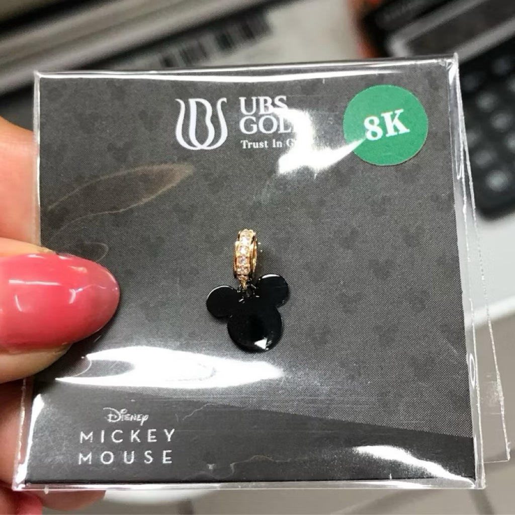 EV3- LIONTIN/CHARM MICKEY BLACK GOLD 0.6GR KADAR 375 8K UBS DISNEY