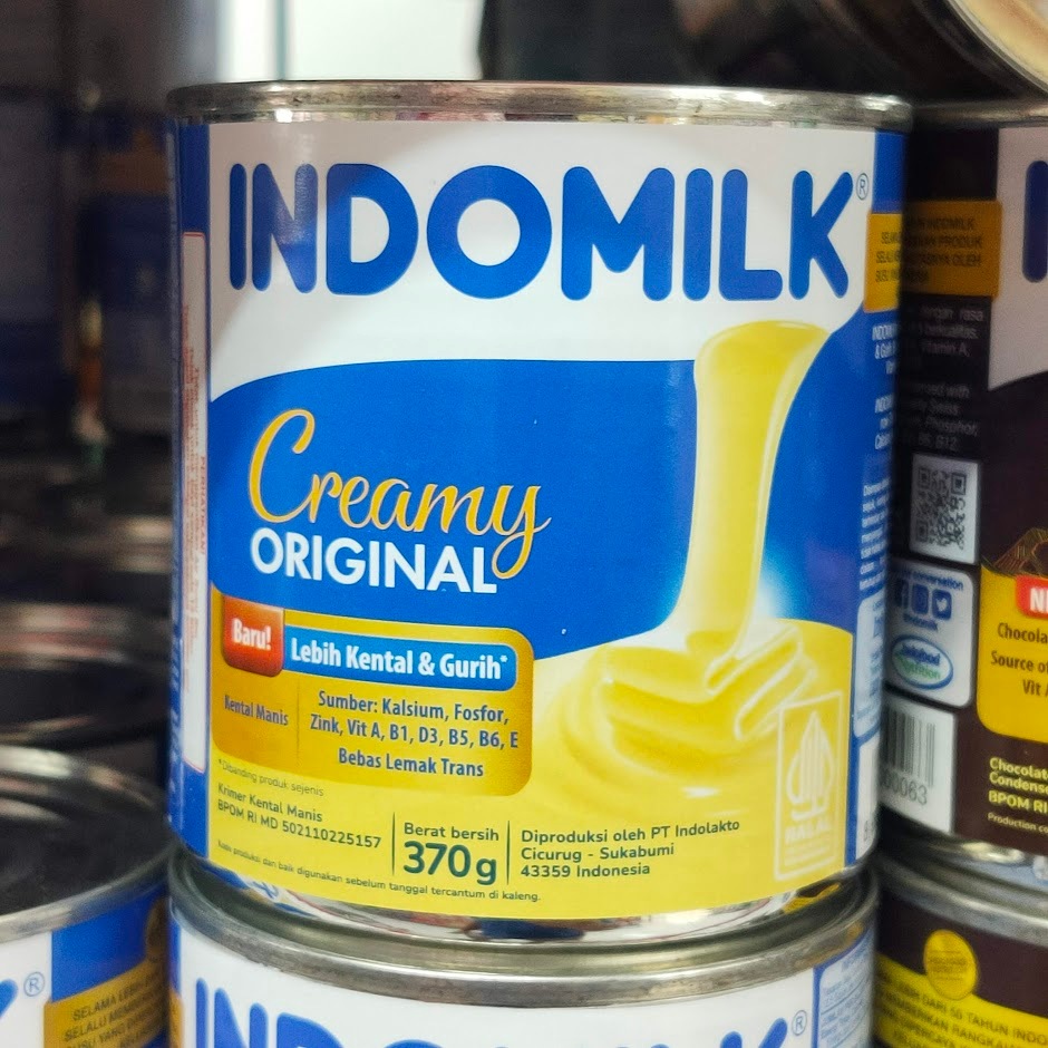 

Susu Kental Manis INDOMILK Kaleng 370gr Putih / Cokelat