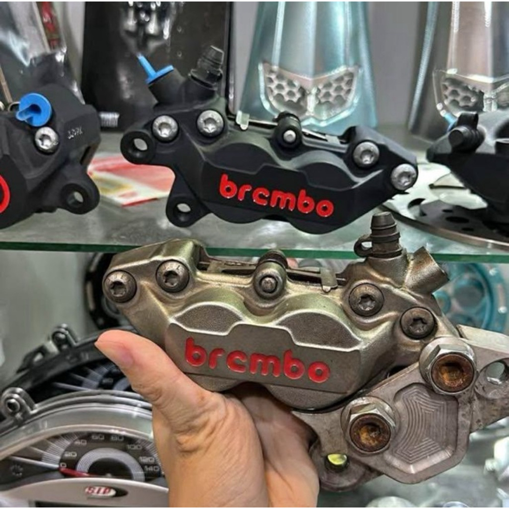 brembo 4 pot + bracket xmax