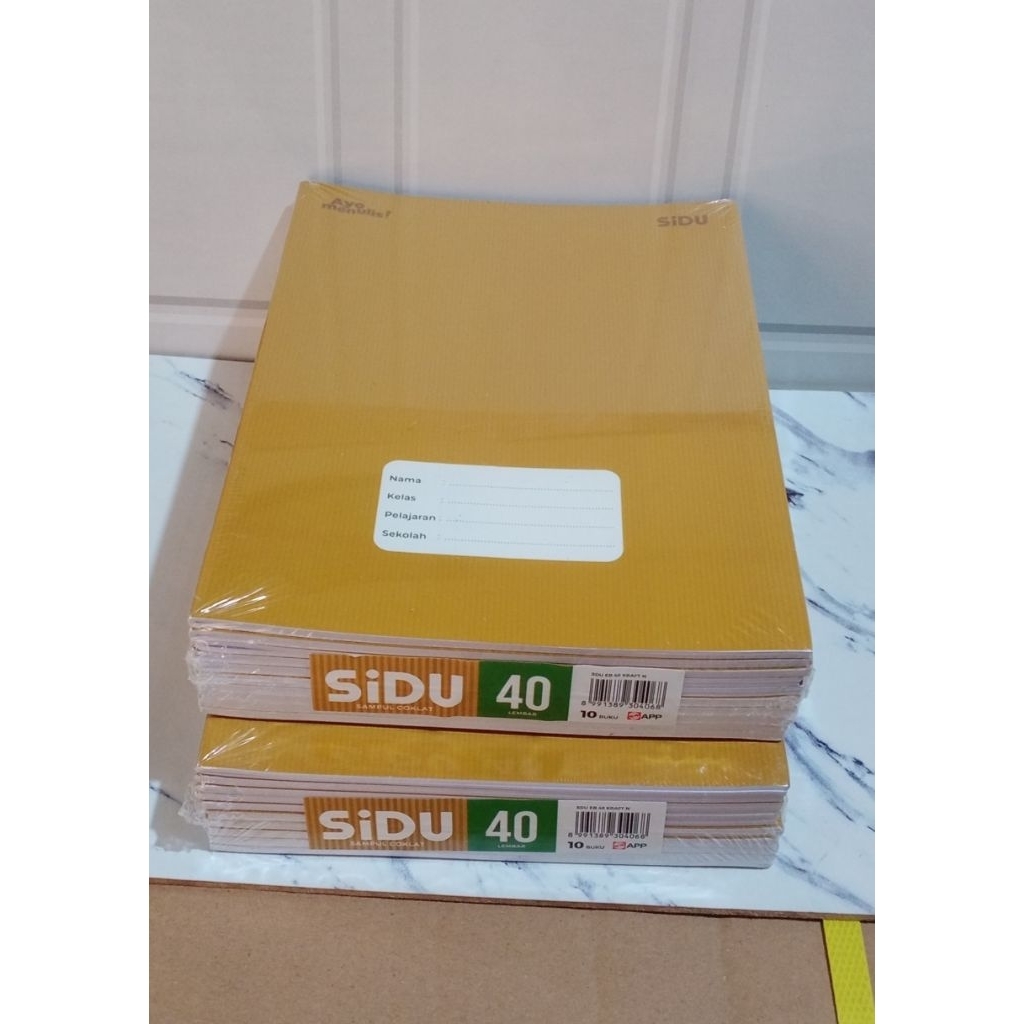 

BUKU TULIS SIDU 40 LEMBAR COVER COKLAT + NAMA 1 PAK ISI 10 BUKU