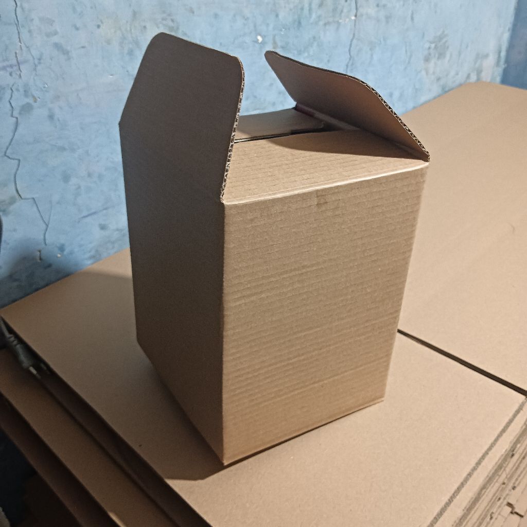 

kardus packing kemasan pakaian
