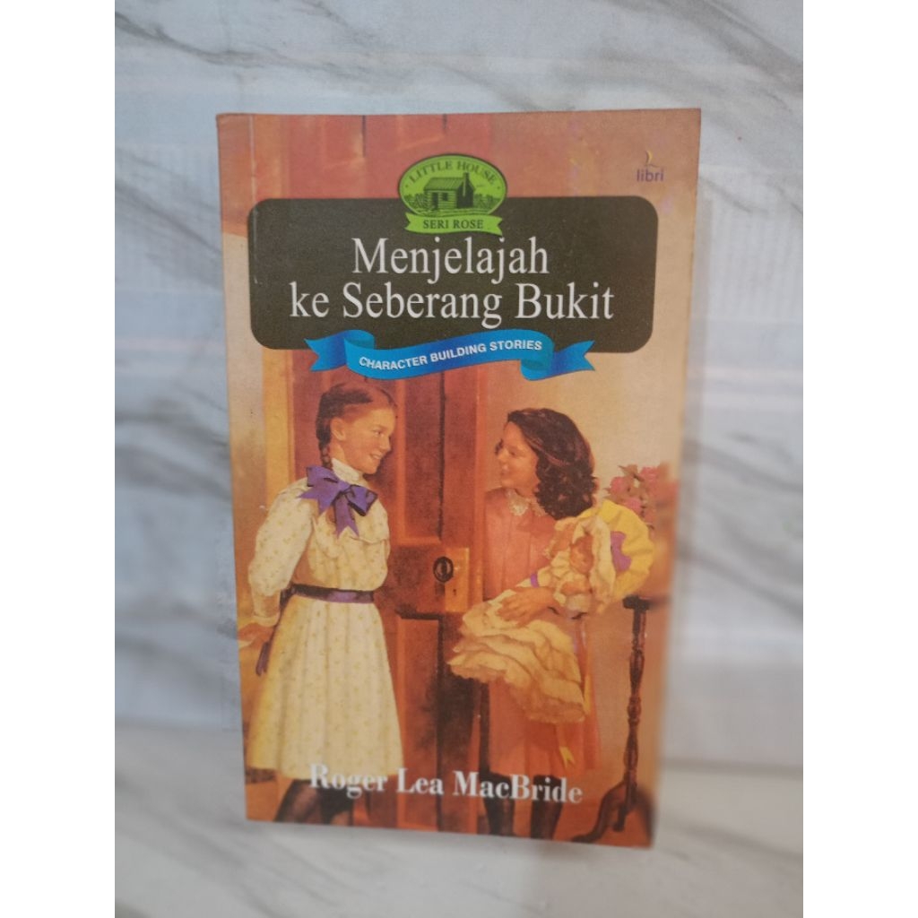 MENJELAJAH KE SEBERANG BUKIT by roger lea macbride