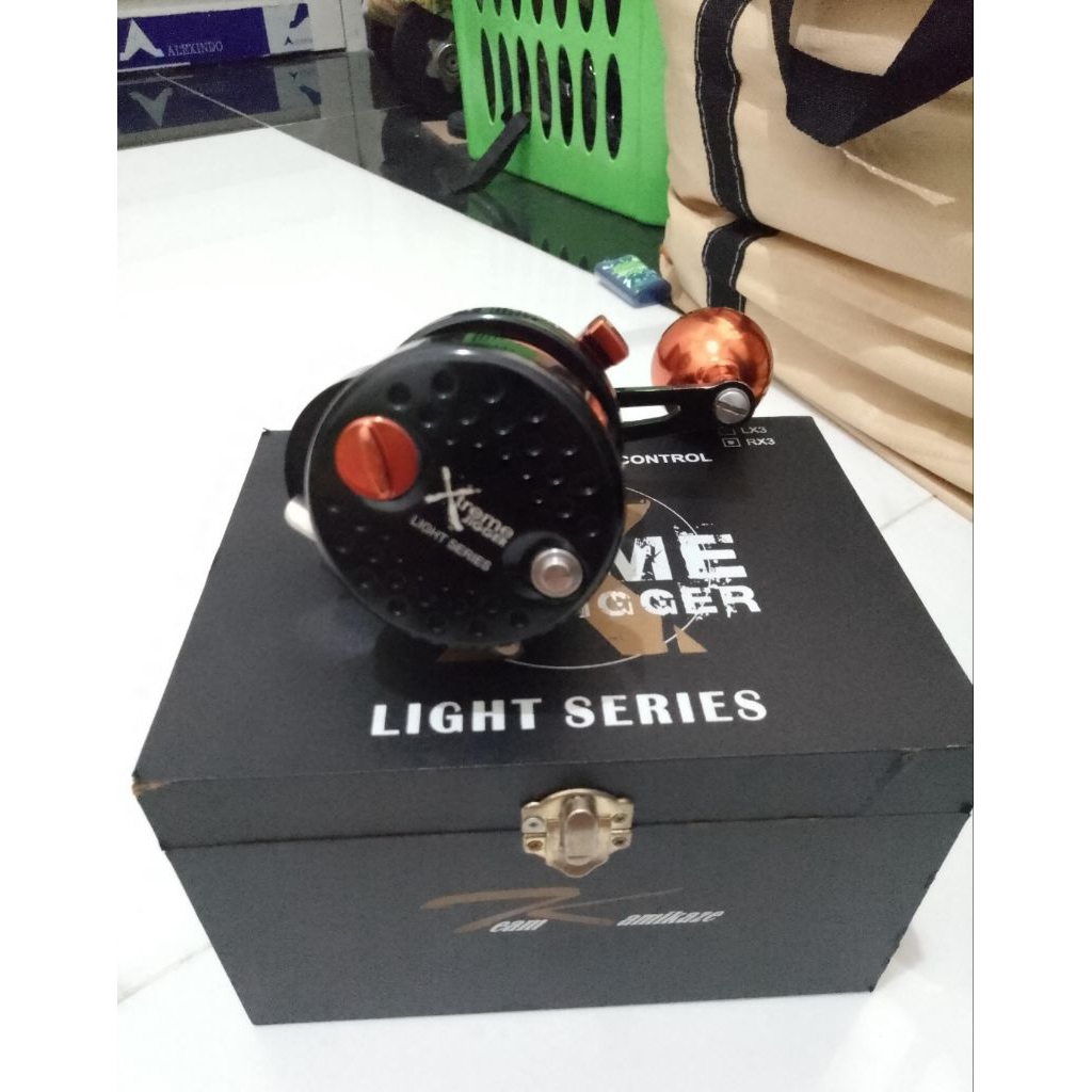 reel OH xtreme jigger light series rx3 (handle kanan)