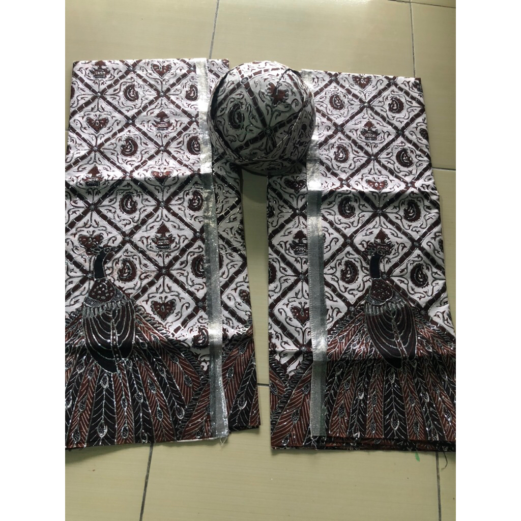 kain prada batik pengantin merak