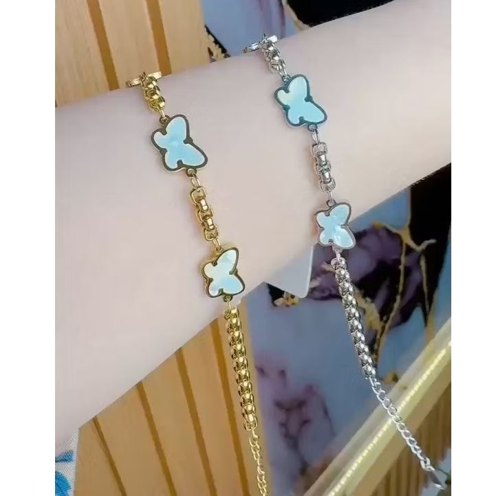 Gelang titanium kupu² putih