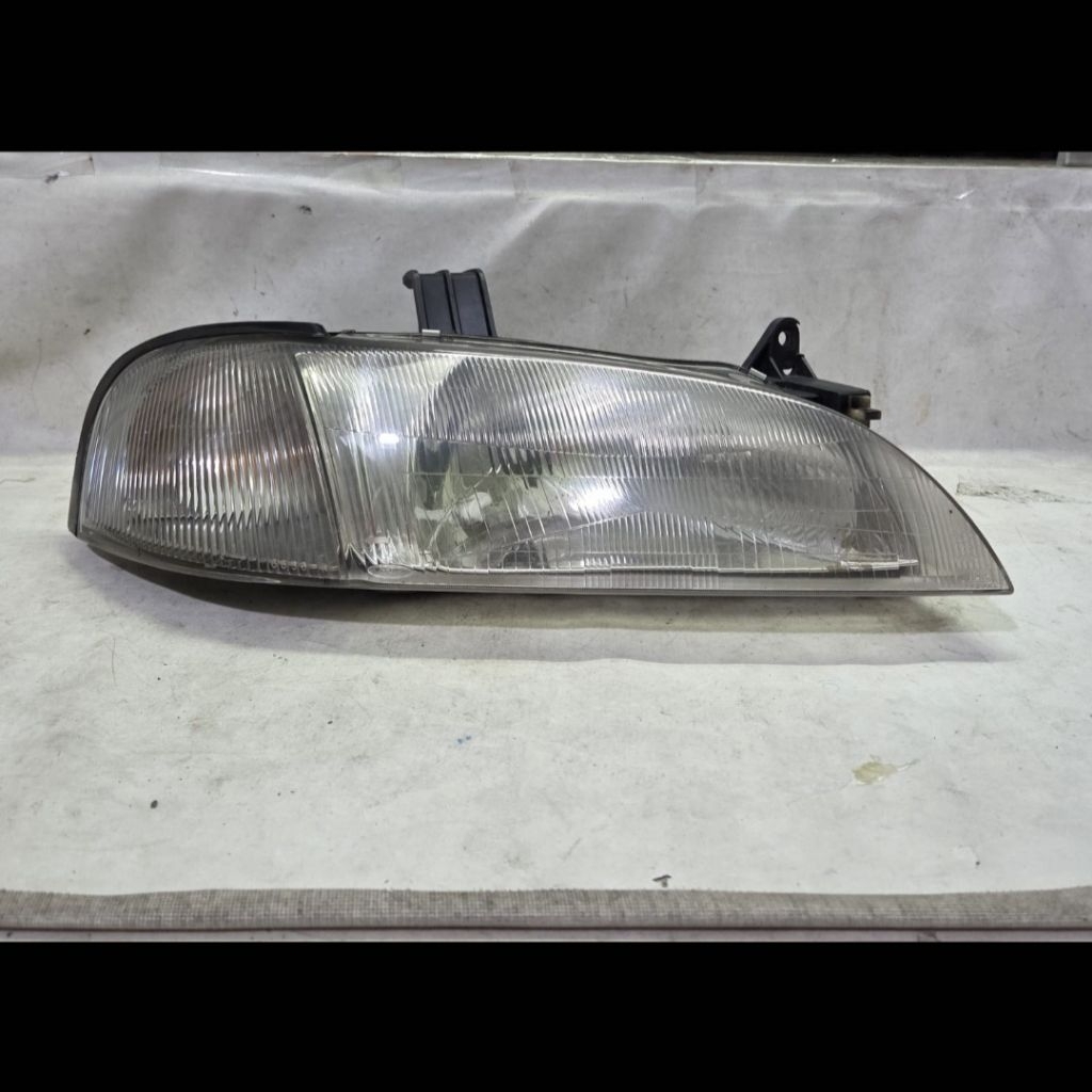 Headlamp lampu depan kanan ford laser LYNX ghia 96 97 98 original