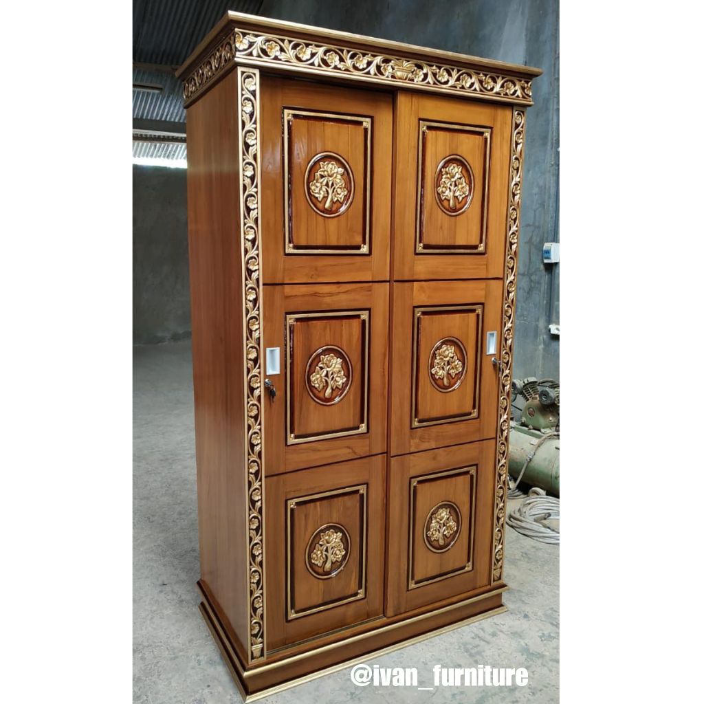 Lemari pakaian sliding kayu jati ukiran Almari sliding jati ukir jepara