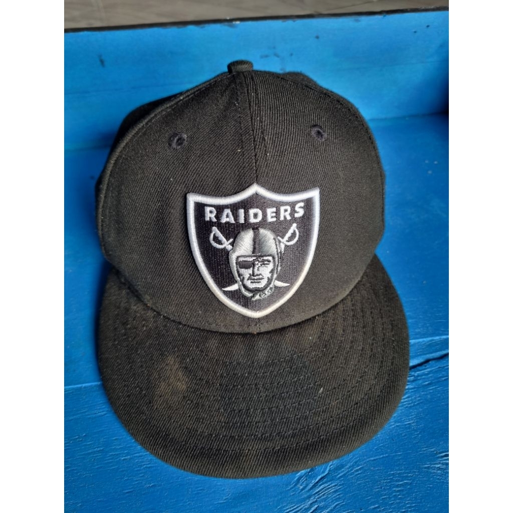topi new era raiders