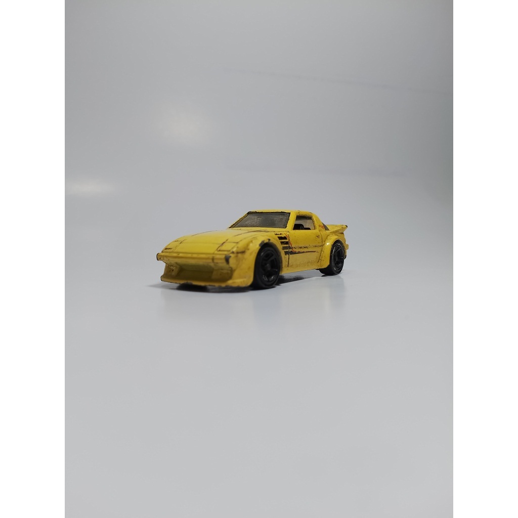 Hot Wheels Mazda RX-7 Kuning Loose Tanpa Blister Kondisi Asli Cocok Untuk Proyek Custom Dan Koleksi 