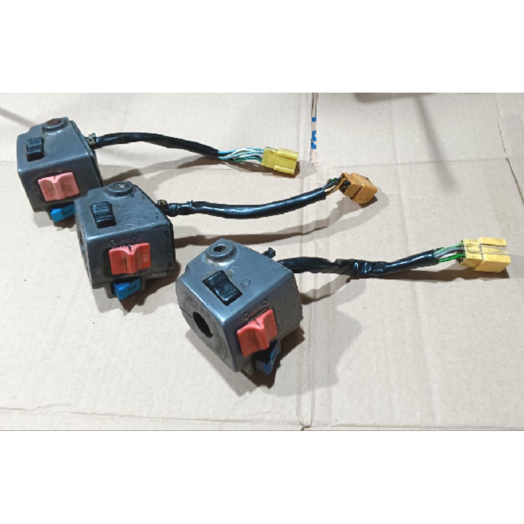 HOLDER KIRI SUZUKI CRYSTAL RC100 BRAVO ORIGINAL