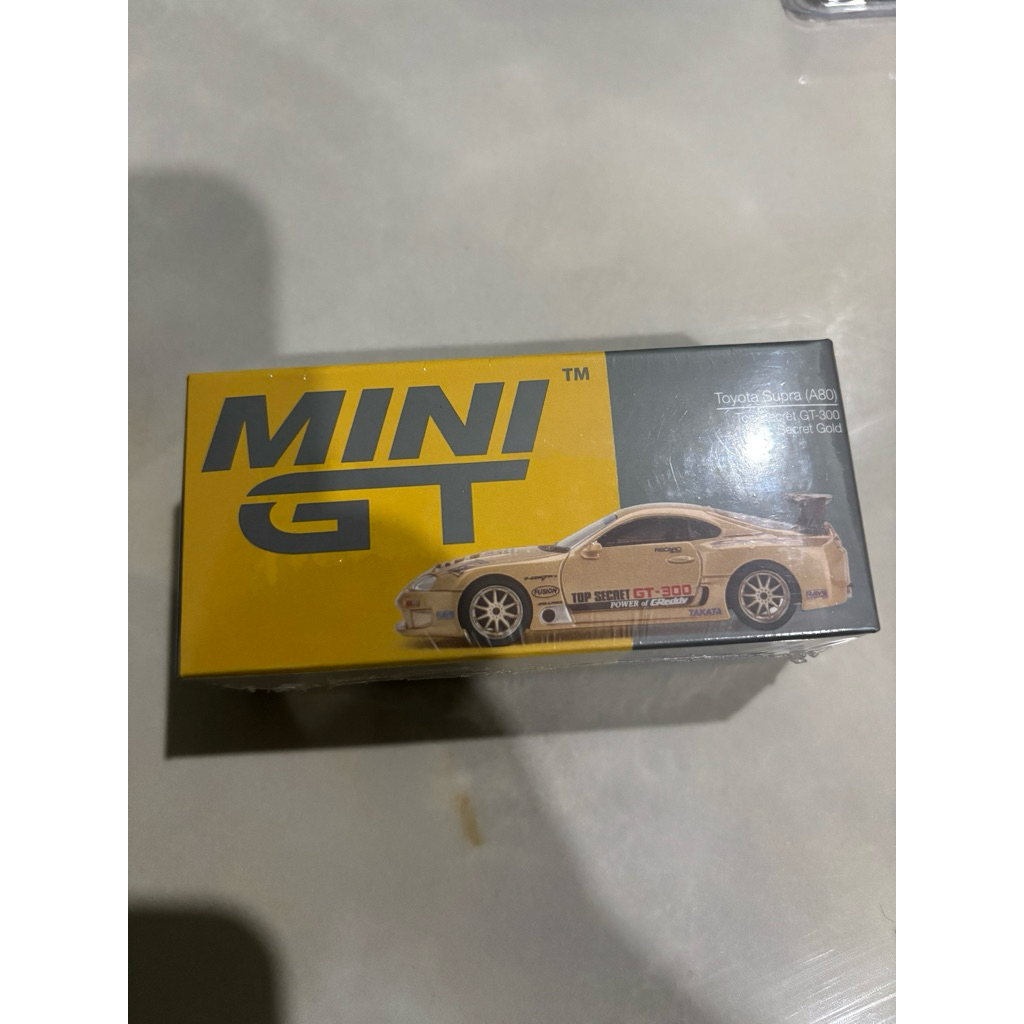 Mini GT Supra Top Secret Gold
