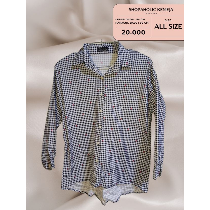 Shopaholic Kemeja kotak-kotak